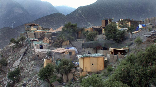 Image courtesy of Huffington Post and Outpost Films (Image copyright). Photo is of Outpost Restrepo, Korengal Valley, Kunar Province, Afghanistan; taken as a film still from the documentary Restrepo, by Tim Heatherington and Sebastian Junger.